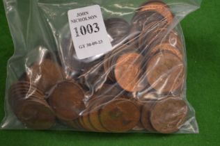 A quantity of pre-decimal half penny coins.