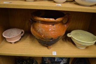 Three early pottery vessels.