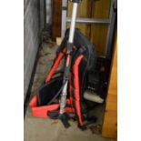 A long reach back pack hedge cutter with accessories.