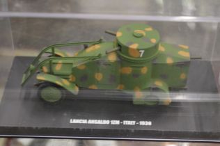 A model of an early tank/armoured car.