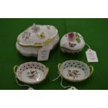 A Herend porcelain box and cover together with a similar smaller box and two small pierced baskets.