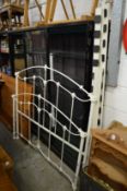 A Victorian style white painted wrought iron double bed frame.