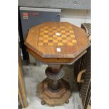 A Victorian walnut work/games table (faults).