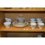 A Colclough floral decorated six place tea service.