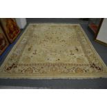 Indian carpet, cream ground with stylised floral decoration, 310cm x 250cm.