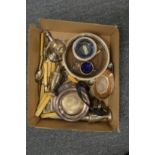 A box of silver and plated items.