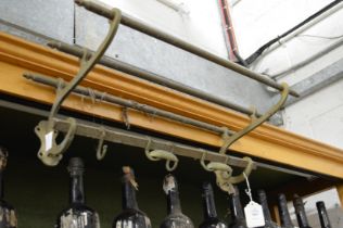 A brass coat/hat rack.