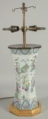 A 19TH CENTURY FAMILLE VERTE PORCELAIN OCTAGONAL VASE, converted to a lamp, painted with various