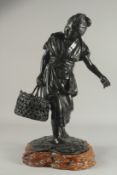 A SUPERB LARGE JAPANESE MEIJI SIGNED BRONZE STATUE, of a figure carrying a basket of shellfish, on a