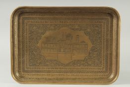 A FINE 19TH-20TH CENTURY PERSIAN QAJAR ENGRAVED BRASS TRAY, depicting a mosque with inscription,