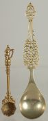 A FINE LARGE PERSIAN OPENWORKED SPOON, together with another Indian brass spoon, (2).