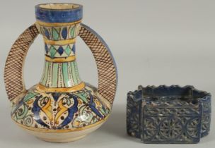 A MOROCCAN TWIN HANDLED VASE AND ANOTHER BLUE GLAZE INKWELL, (2).