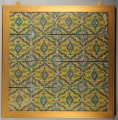 A SET OF SIXTEEN 19TH CENTURY SAFAVID STYLE IRANIAN QAJAR GLAZED POTTERY TILES, decorated with