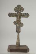 A FINE 18TH CENTURY OTTOMAN ARMINIAN OR BALKANS ENAMELLED CROSS on a later wooden stand, cross