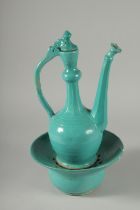 A RARE 17TH-18TH CENTURY PERSAIN SAFAVID MONOCHROME TURQUOISE GLAZED POTTERY LIDDED EWER AND