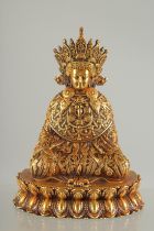 A FINE TIBETAN HEAVY GILT BRONZE BUDDHA, 11cm high.