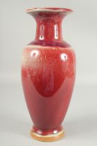 A CHINESE FLAMBE-TYPE PORCELAIN VASE, with impressed character mark to base, 35cm high.