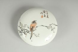 A CHINESE PORCELAIN CIRCULAR BOX AND COVER, painted with a bird on a branch, character mark to base,