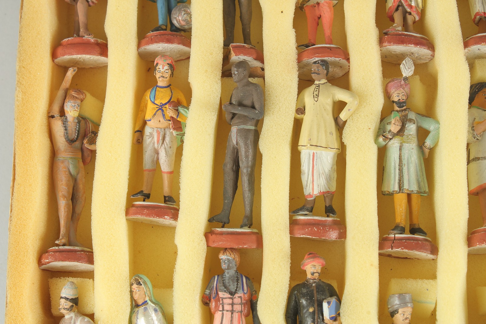 A LARGE COLLECTION OF EARLY 20TH CENTURY INDIAN CERAMIC FIGURES, each approx. 8cm, (some with - Image 6 of 10