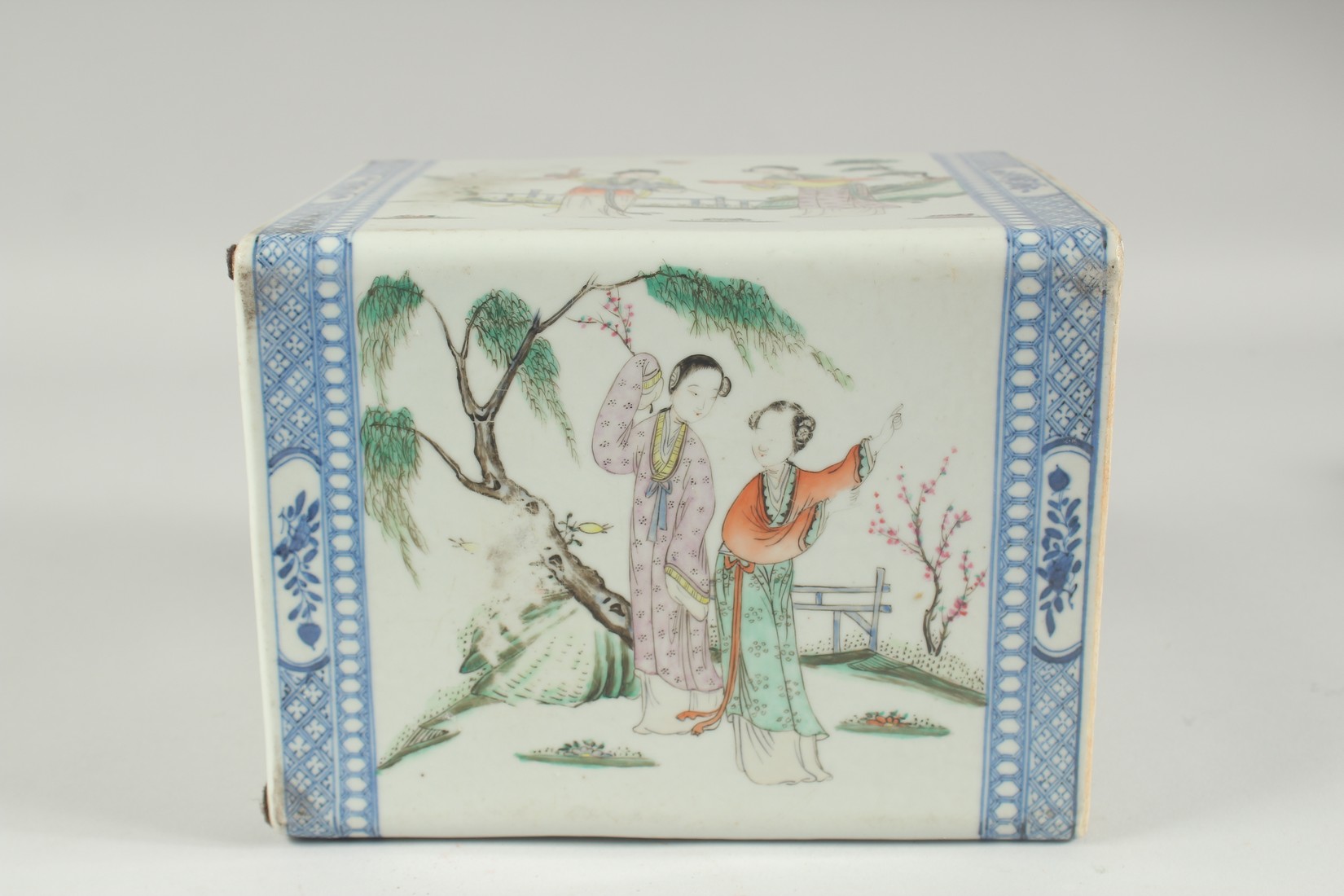 A CHINESE FAMILLE ROSE PORCELAIN PILLOW, and later wooden stand, painted with scenes of female - Image 7 of 7