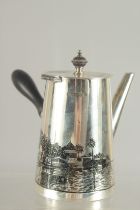 A SMALL SIGNED IRAQI NIELLO SILVER POURING POT, signature to the right of illustration and with