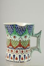 A 19TH CENTURY ITALIAN CANTAGALLI IZNIK STYLE TANKARD, 10cm high.