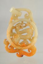 A CHINESE JADE RING PENDANT, 8cm x 5cm.