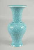 A CHINESE POWDER BLUE GLAZE CARVED PORCELAIN VASE, with lotus and bats, base with character mark,