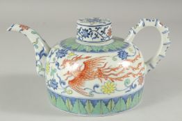 A CHINESE DOUCAI PORCELAIN TEAPOT, painted with phoenix, 22.5cm wide (spout to handle).