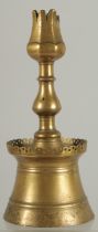 A RARE 16TH-17TH CENTURY OTTOMAN TURKISH BRASS TULIP CANDLESTICK, 23cm high.