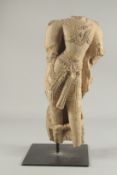 A FINE POSSIBLY 12TH CENTURY NORTH INDIAN CARVED YELLOW STONE TORSO OF A FEMALE DEITY, the torso