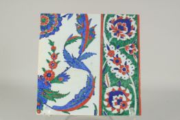 AN OTTOMAN TURKISH GLAZED POTTERY TILE, 27.5cm square.