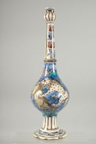 A FINE 19TH CENTURY PERSIAN QAJAR GLAZED POTTERY BOTTLE VASE, painted with animals, (neck repair),