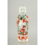 A CHINESE COPPER RED AND GREEN PORCELAIN FIGURE, 11.5cm high.