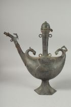 A FINE LARGE INDIAN BRASS BOAT SHAPED LIDDED EWER, 38.5cm high, 35cm wide.