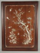 A LARGE CHINESE MOTHER OF PEARL INLAID HARDWOOD PANEL, beautifully inlaid to depict birds and