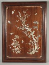 A LARGE CHINESE MOTHER OF PEARL INLAID HARDWOOD PANEL, beautifully inlaid to depict birds and