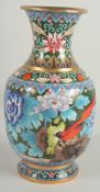 A FINE AND LARGE CHINESE CLOISONNE VASE, beautifully decorated with birds and native flora using
