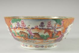 A CHINESE EXPORT FAMILLE ROSE MANDARIN PATTERN PORCELAIN PUNCH BOWL, the exterior painted with two