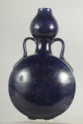 A CHINESE IMPERIAL BLUE GLAZE TWIN HANDLE MOON FLASK VASE, 27cm high.
