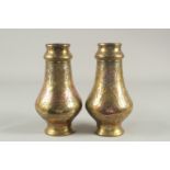 A PAIR OF LATE 19TH-EARLY 20TH CENTURY SYRIAN DAMASCUS CAIROWARE SILVER AND COPPER INLAID VASES,