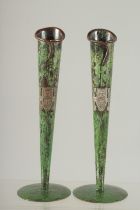 A PAIR OF GREEN ENAMEL FLUTED VASES. 6.75ins high.