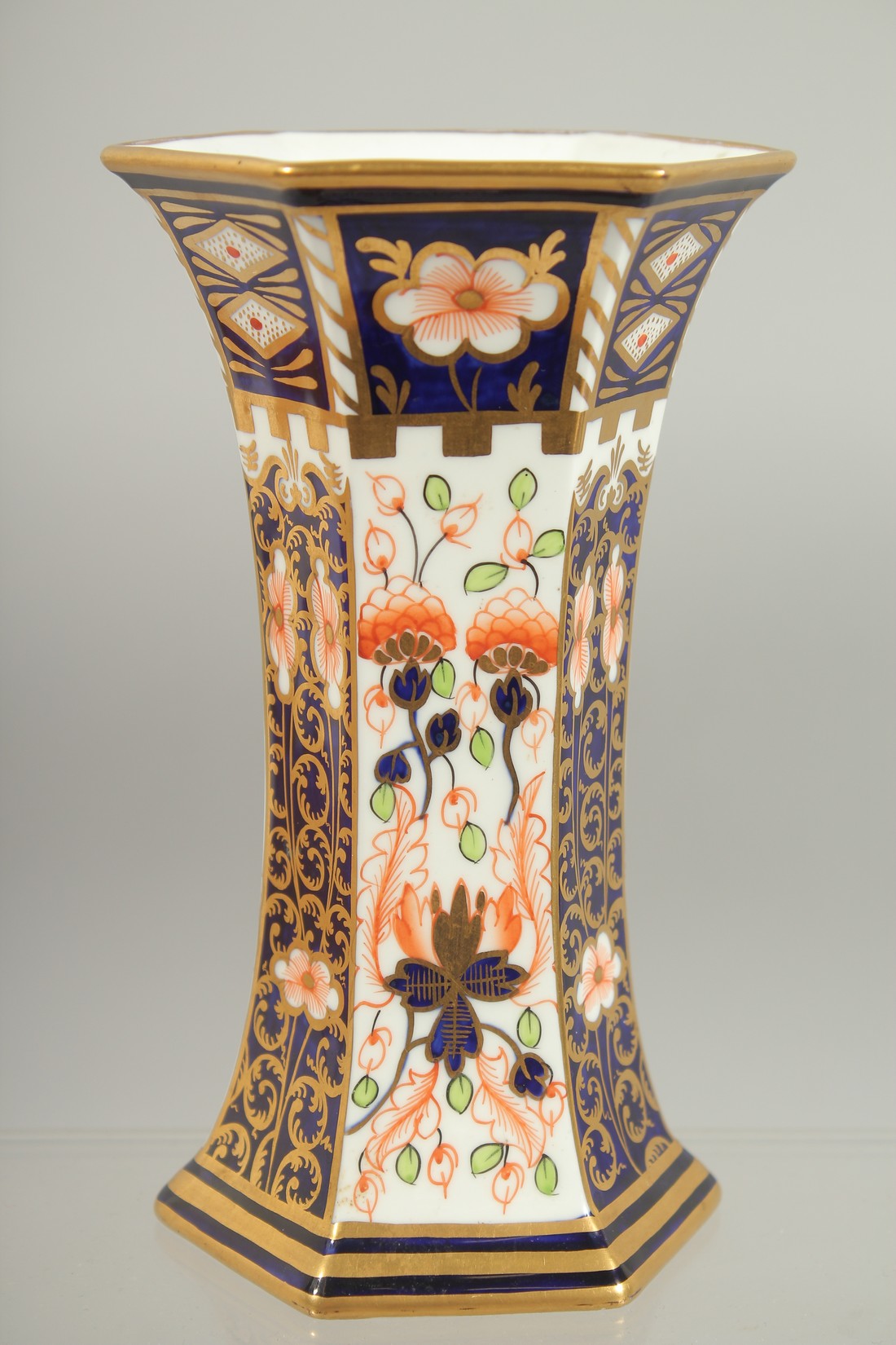 A ROYAL CROWN DERBY HEXAGONAL VASE. Pattern 6299.