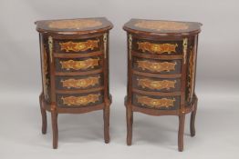 A PAIR OF FRENCH STYLE MAHOGANY, WALNUT MARQUETRY AND ORMOLU BOW FRONT FOUR DRAWER BEDSIDE CHESTS.