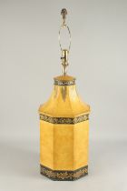 AN OCTAGONAL YELLOW GROUND TOLEWARE STYLE TABLE LAMPS, 2ft 10ins high incl. lamp fittings.