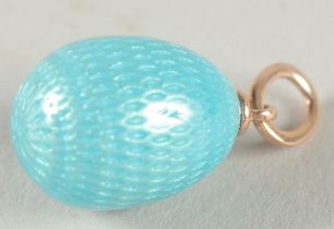A 14CT GOLD RUSSIAN BLUE EGG PENDANT with a snake.