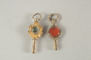 TWO VARIOUS WATCH KEYS with seals.