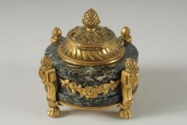 A GOOD 19TH CENTURY FRENCH CIRCULAR MARBLE AND ORMOLU INKWELL with pineapple finial, on claw feet.