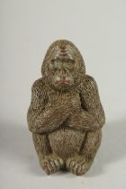 A JAPANESE BRONZE GORILLA. 1.75ins.