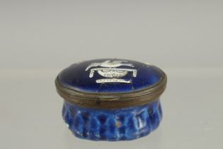 A BILSTON BLUE ENAMEL PATCH BOX "A PLEDGE OF LOVE a mirror in the lid. 1.5ins x 1.25in.